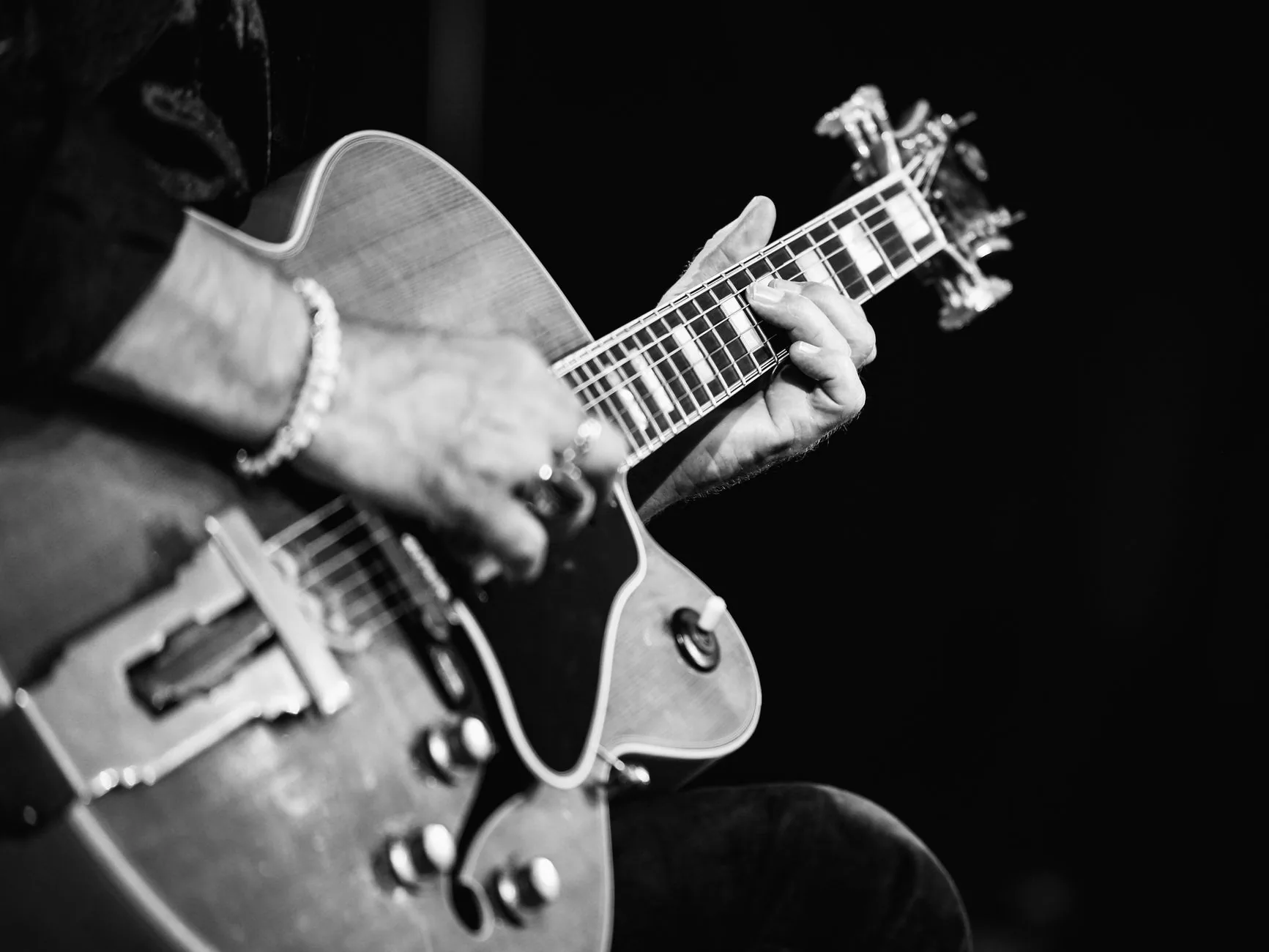 Folk guitarist at an intimate concert