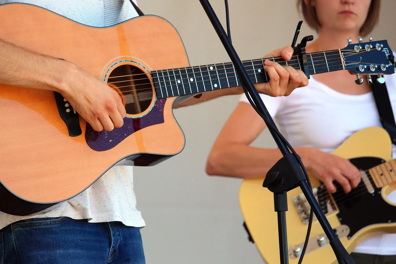 Folk guitar duo on stage