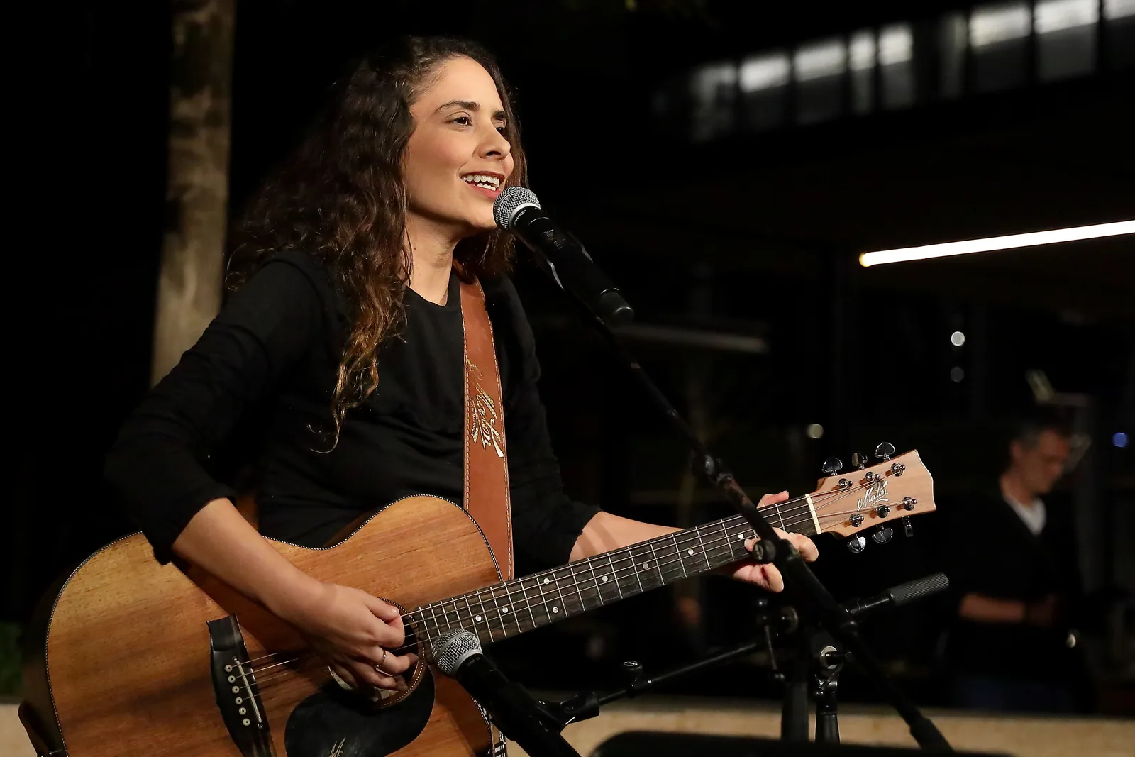 Folk singer with an acoustic guitar
