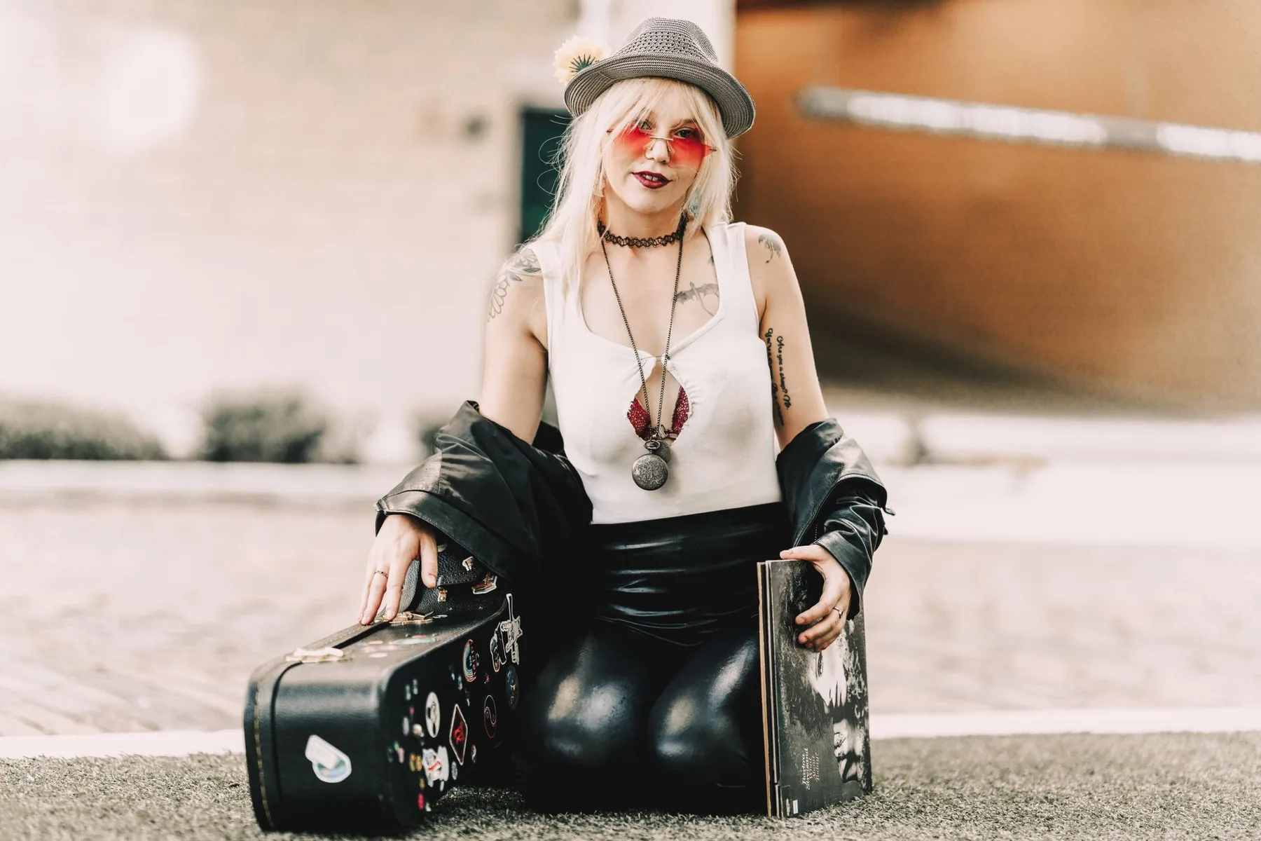 Folk artist with music cases Folk artist with music cases