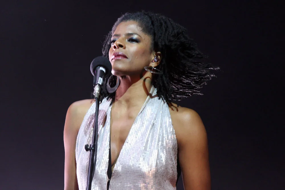 Singer performing in front of her microphone
